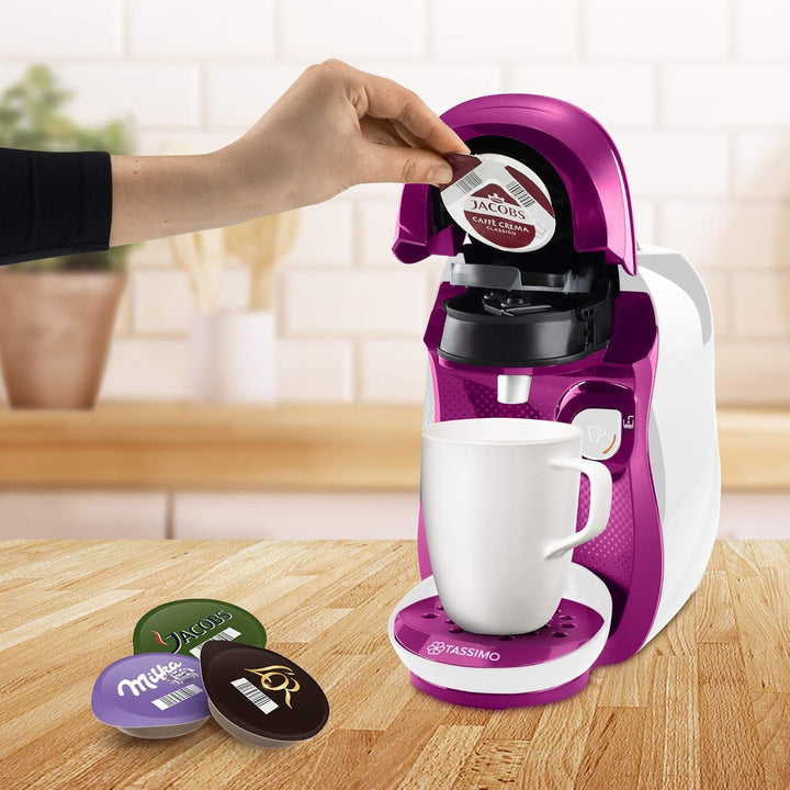 Espressor Bosch Tassimo Happy Capsule TAS1001, 70 de băuturi, complet automat, potrivit pentru toate tipurile de cești, economisește spațiu, 1400 W, roz