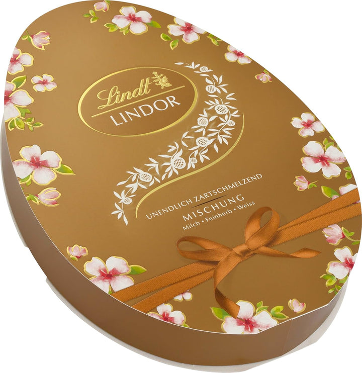 Lindt Schokolade LINDOR Eierkarton | 168 G | 6 X LINDOR Vollmilch Eier 28G Mit Zartschmelzender Füllung Im Eierkarton | Oster Schokolade | Schokoladengeschenk | Ostereier | Schokoeier