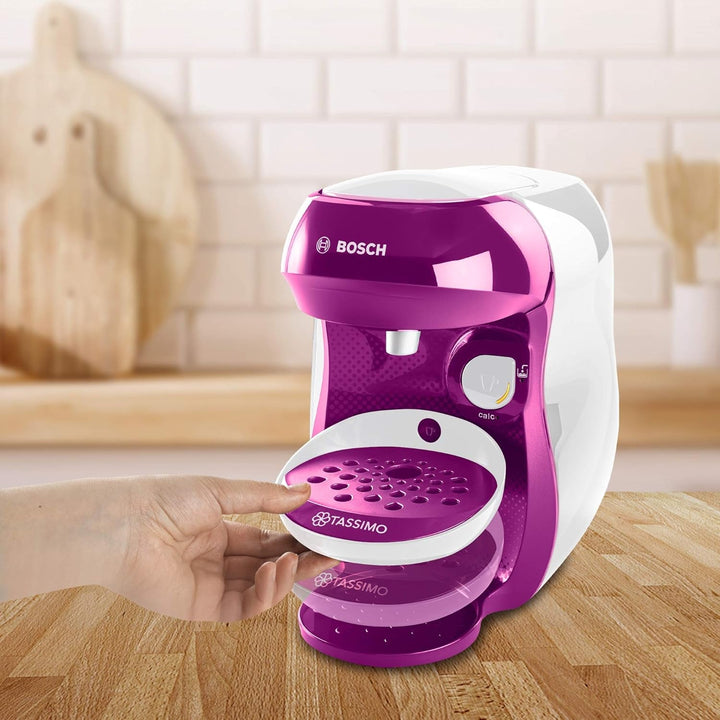 Espressor Bosch Tassimo Happy Capsule TAS1001, 70 de băuturi, complet automat, potrivit pentru toate tipurile de cești, economisește spațiu, 1400 W, roz