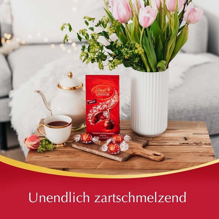 Lindt Schokolade LINDOR Kugeln Milch | 100G Im Beutel | Ca. 7 Kugeln Vollmilchschokolade Mit Zartschmelzender Füllung | Pralinen-Geschenk | Schokoladen-Geschenk