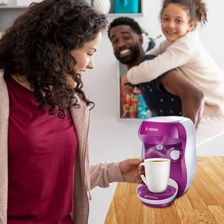 Espressor Bosch Tassimo Happy Capsule TAS1001, 70 de băuturi, complet automat, potrivit pentru toate tipurile de cești, economisește spațiu, 1400 W, roz